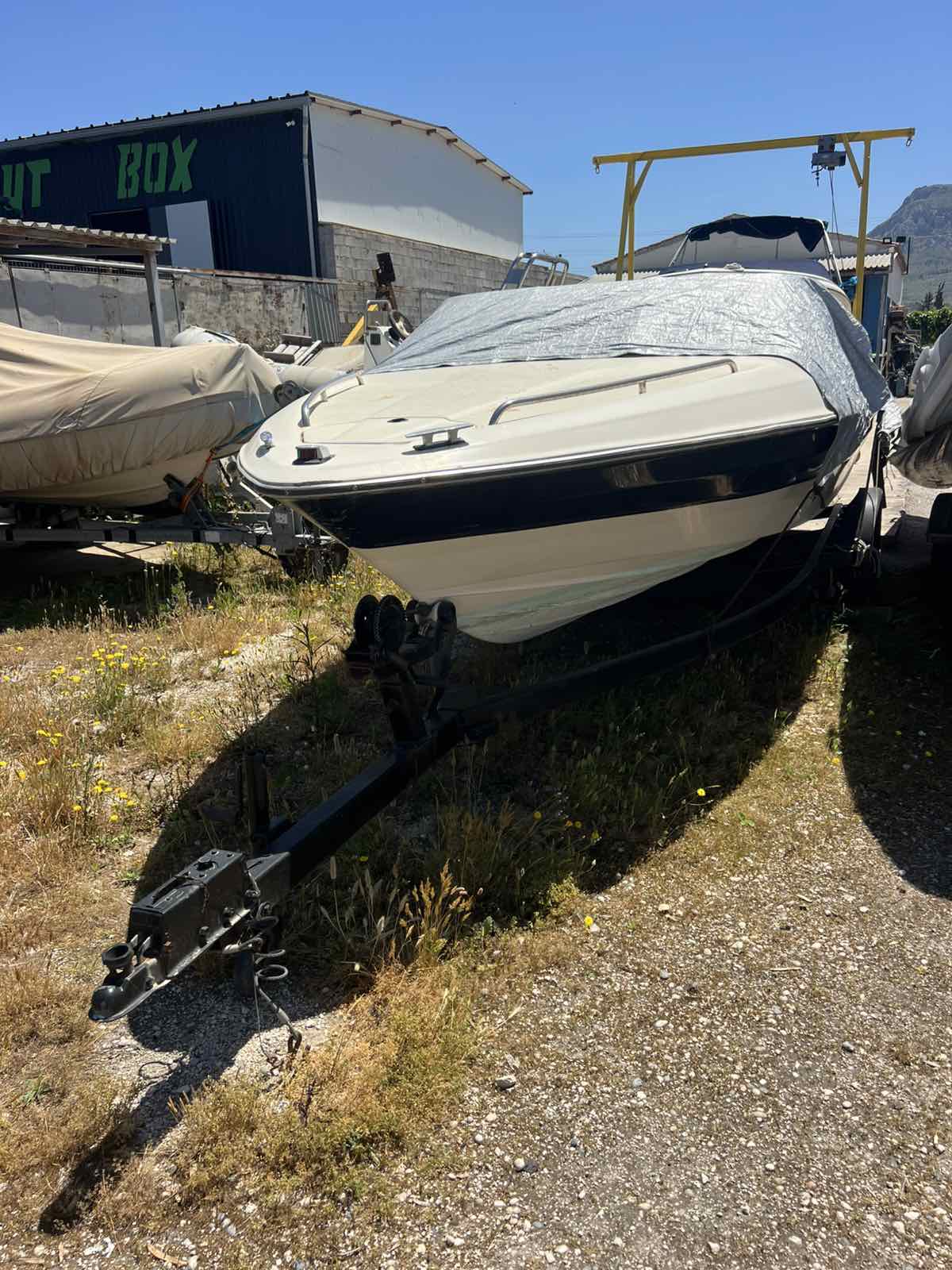 Bow, covered, boatyard